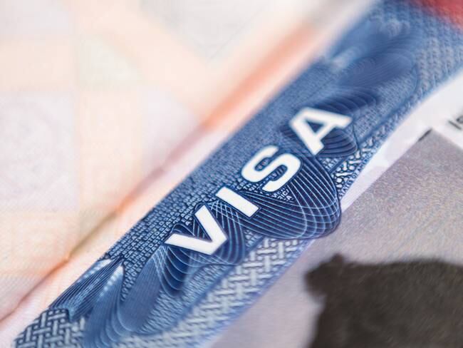 Close up of american visa label in passport. SHallow depth of field.