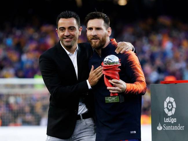 Lionel Messi y Xavi Hernández en un encuentro entre el Barcelona y el Real Sociedad en la Liga Santander. Foto: Getty Images