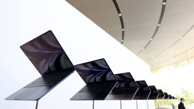 CUPERTINO, CALIFORNIA - JUNE 06: Newly redesigned MacBook Air laptops are seen displayed during the WWDC22 at Apple Park on June 06, 2022 in Cupertino, California. Apple CEO Tim Cook kicked off the annual WWDC22 developer conference.  (Photo by Justin Sullivan/Getty Images)