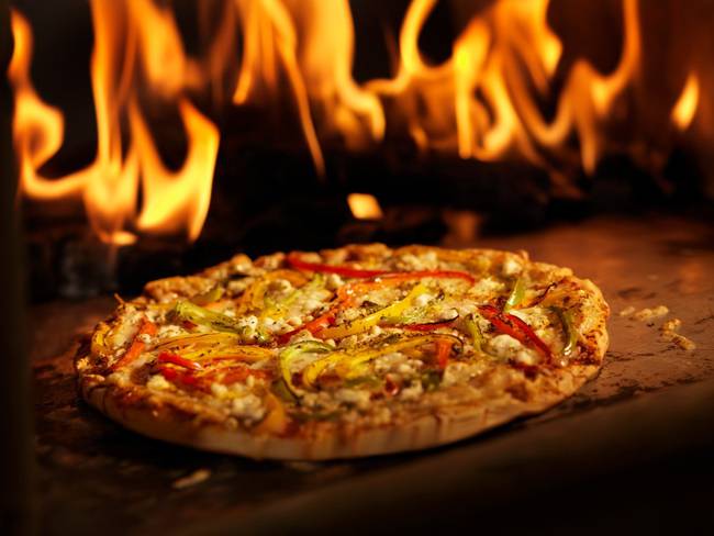 Dos muertos en restaurante de Madrid: una pizza causó un incendio