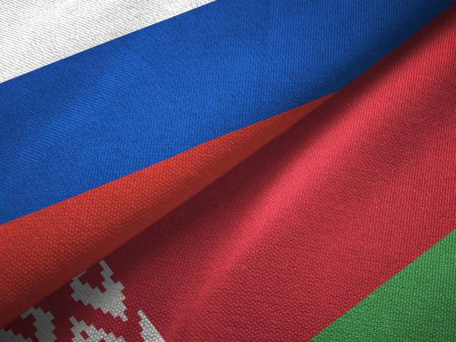 Belarus and Russia flag together realtions textile cloth fabric texture