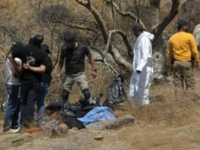Expertos forenses trabajarón en el levantamiento de varias bolsas con restos humanos, México, 02 de Junio del 2023. afp_tickers