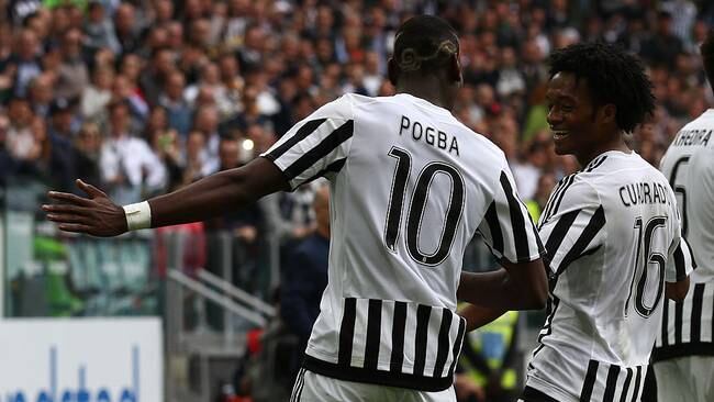 Paul Pogba y Juan Guillermo Cuadrado en la Juventus. (Photo by Matteo Bottanelli/NurPhoto via Getty Images)
