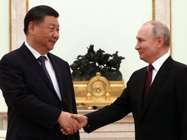 Presidente de Rusia Vladimir Putin y presidente de China Xi Jinping. (Photo by Sergei KARPUKHIN / SPUTNIK / AFP) (Photo by SERGEI KARPUKHIN/SPUTNIK/AFP via Getty Images)