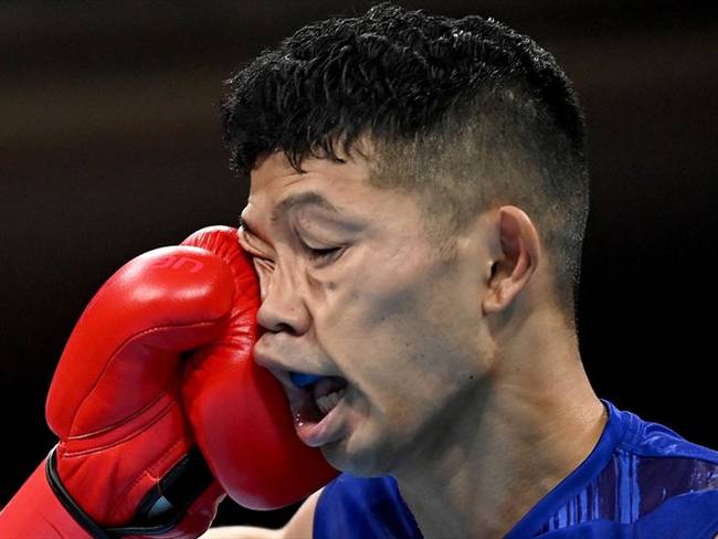 Ryomei Tanaka recibió fuerte golpe del colombiano Yuberjen Martínez en los Juegos Olímpicos de Tokio 2020. Foto: Luis Robayo - Pool/Getty Images
