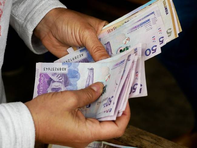La entrega de pagos acumulados de enero y febrero de Ingreso Solidario beneficiará a más de tres millones de hogares bancarizados. Foto: Getty Images / RICARDO VALLEJO