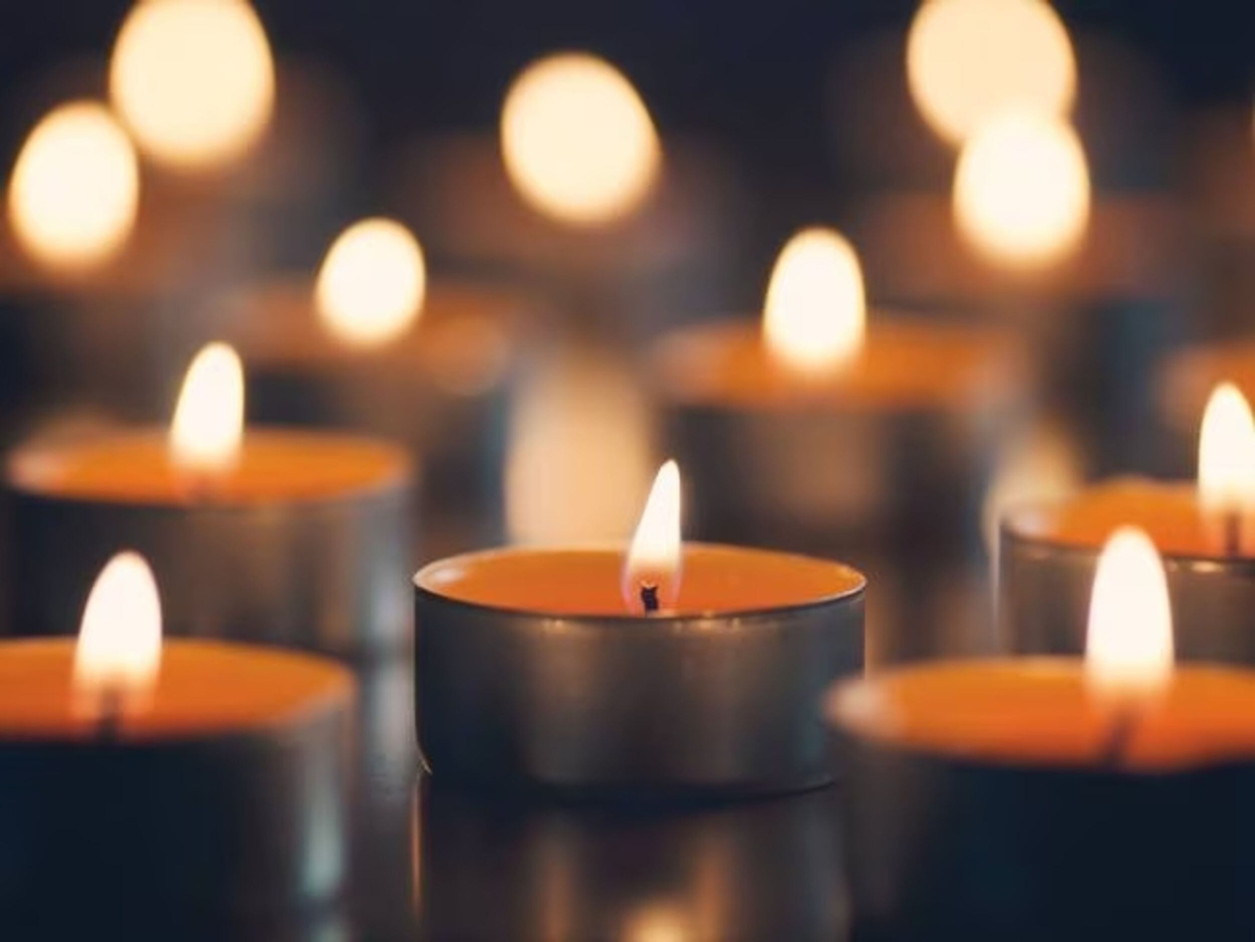 Small orange candles lit