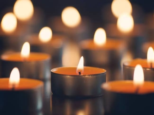 Small orange candles lit