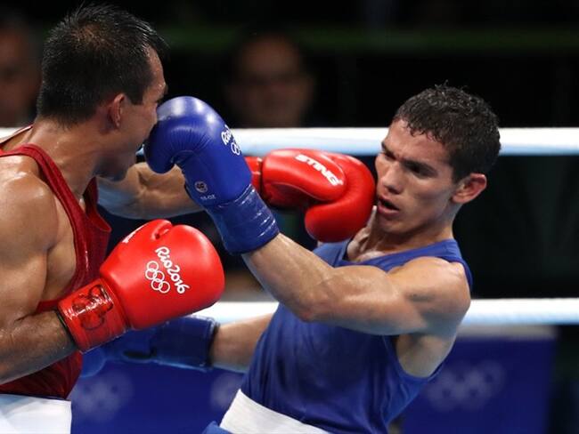 Céiber Ávila (azul). Foto: Agencia EFE