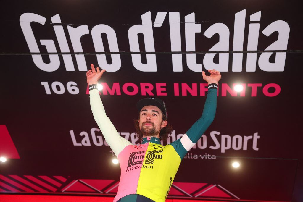 EF Education-EasyPost's Irish rider Ben Healy celebrates on the podium after winning the eighth stage of the Giro d'Italia 2023 cycling race, 207 km between Terni and Fossombrone, on May 13, 2023. (Photo by Luca Bettini / AFP) (Photo by LUCA BETTINI/AFP via Getty Images)