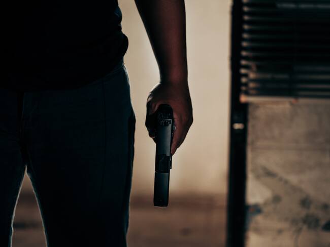 Hombre armado imagen de referencia. Foto: Getty Images.