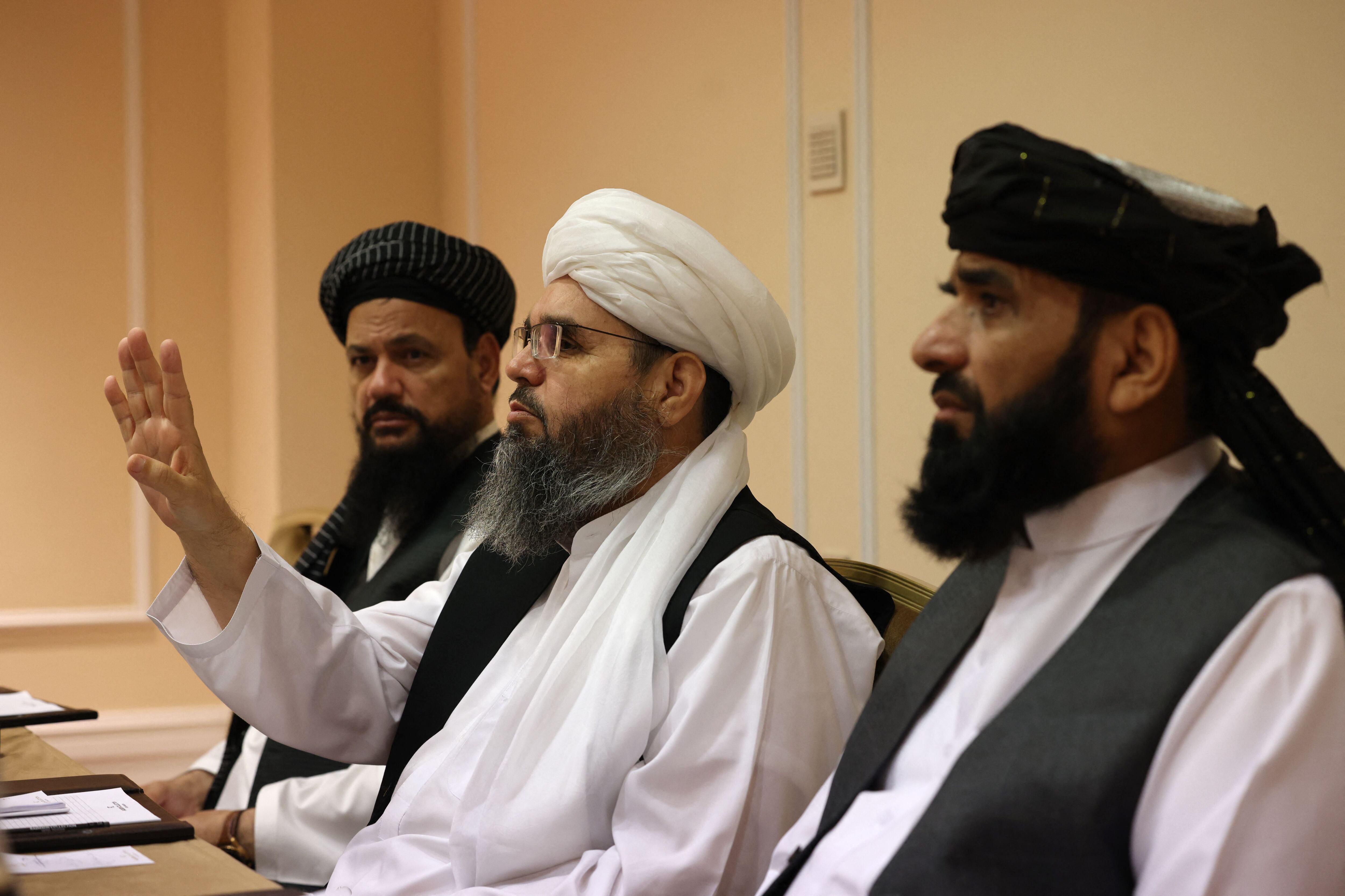 Taliban negotiators Abdul Latif Mansoor (L), Shahabuddin Delawar (C) and Suhail Shaheen (R) attend a press conference in Moscow on July 9, 2021. (Photo by Dimitar DILKOFF / AFP) (Photo by DIMITAR DILKOFF/AFP via Getty Images)