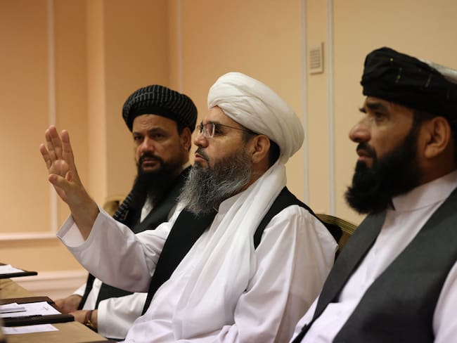 Taliban negotiators Abdul Latif Mansoor (L), Shahabuddin Delawar (C) and Suhail Shaheen (R) attend a press conference in Moscow on July 9, 2021. (Photo by Dimitar DILKOFF / AFP) (Photo by DIMITAR DILKOFF/AFP via Getty Images)