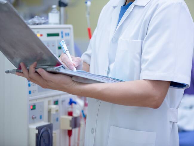 The specialist are doing continuous renal replacement therapy equipment and injection pump.