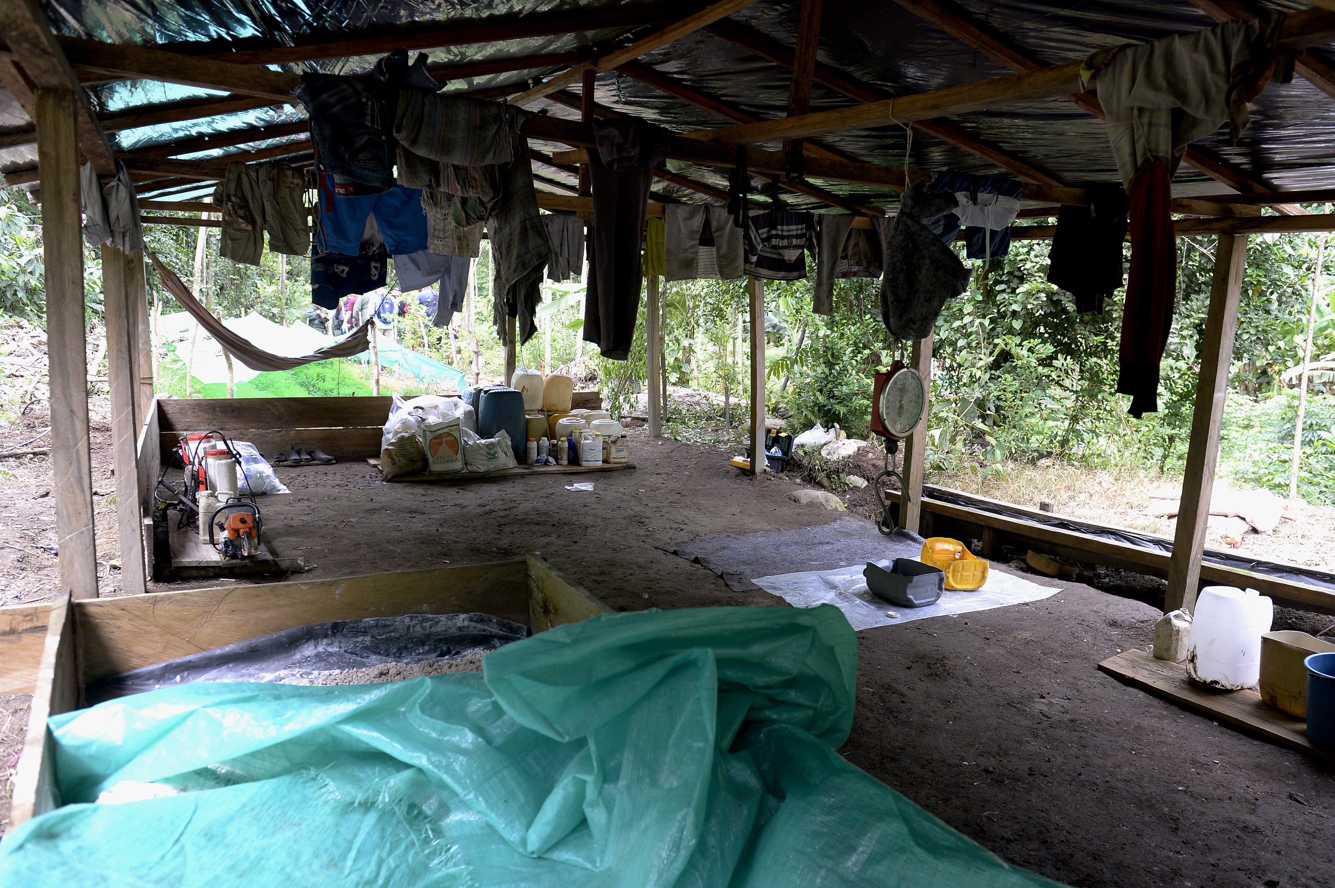 View of a clandestine laboratory for the production of cocaine, located 2 km from the border with Colombia, in the Sierra de Perija, in the state of Maracaibo, Venezuela on December 6, 2014, before its destruction by the military. AFP PHOTO / FEDERICO PARRA        (Photo credit should read FEDERICO PARRA/AFP via Getty Images)