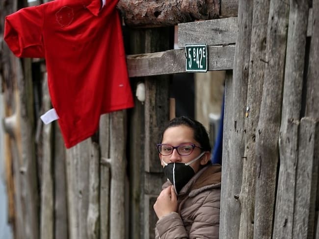 Las protestas se desarrollan a la altura del kilómetro 10. Los ciudadanos dicen que no desbloquearán hasta recibir atención del Gobierno Distrital. . Foto: Colprensa