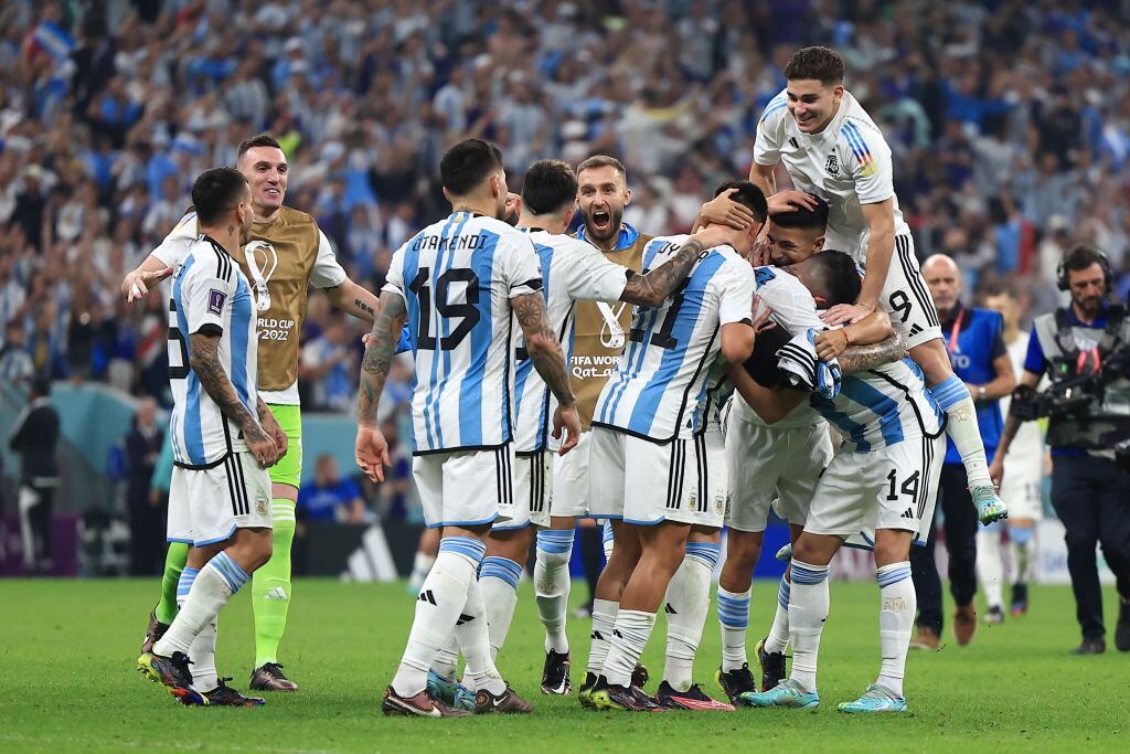 LUSAIL CITY, QATAR - DECEMBER 13: Argentina players celebrate their 3-0 victory in the FIFA World Cup Qatar 2022 semi final match between Argentina and Croatia at Lusail Stadium on December 13, 2022 in Lusail City, Qatar. (Photo by Buda Mendes/Getty Images)
