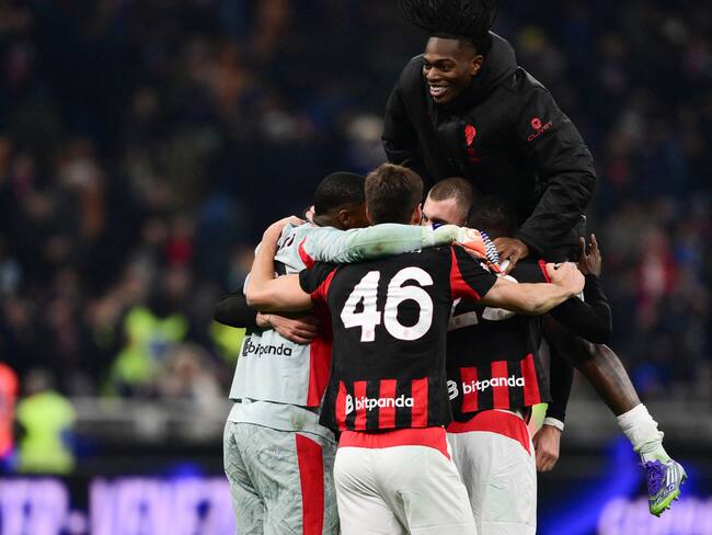 Jugadores del Milán. Foto: Marco BERTORELLO / AFP.