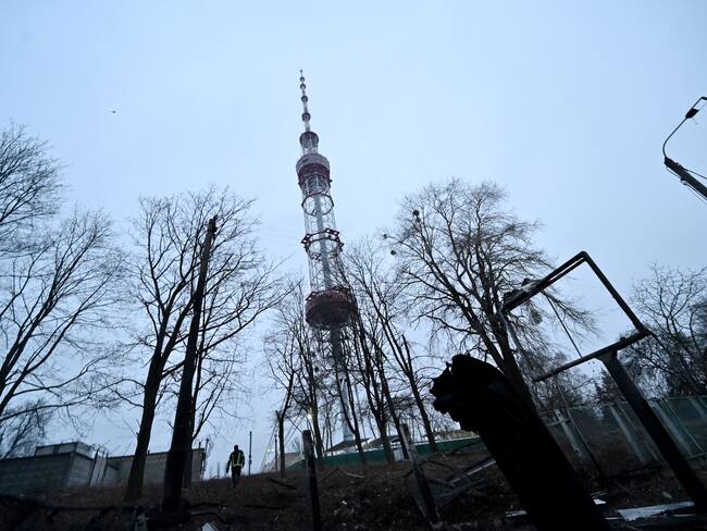 A fireman walks past fragments of missile after Russian airstrike hit Kyiv&#039;s main television tower in Kyiv on March 1, 2022 - An apparent Russian airstrike hit Kyiv&#039;s main television tower in the heart of the Ukrainian capital on March 1, 2022. (Photo by Sergei SUPINSKY / AFP) (Photo by SERGEI SUPINSKY/AFP via Getty Images)