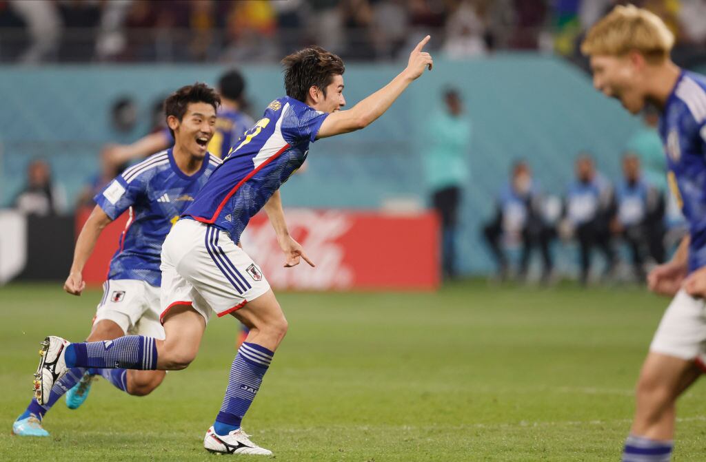 DOHA, QATAR - DECEMBER 01: Ao Tanaka of Japan celebrates 2nd goal during the FIFA World Cup Qatar 2022 Group E match between Japan and Spain at Khalifa International Stadium on December 01, 2022 in Doha, Qatar.. (Photo by Richard Sellers/Getty Images)