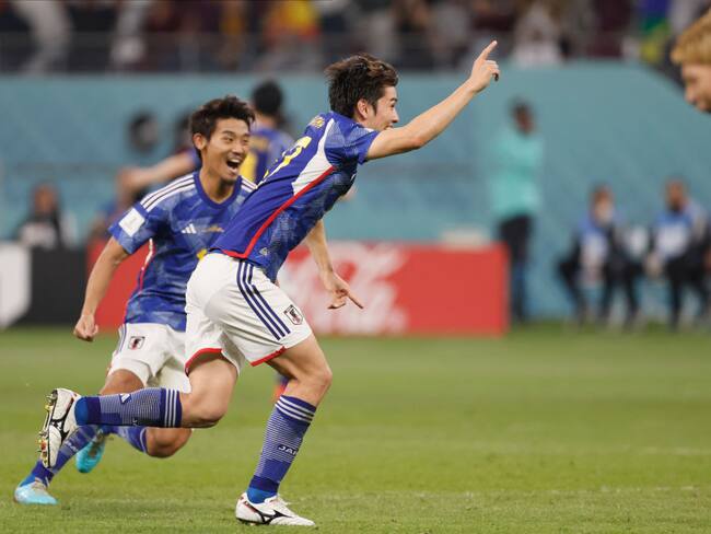 DOHA, QATAR - DECEMBER 01: Ao Tanaka of Japan celebrates 2nd goal during the FIFA World Cup Qatar 2022 Group E match between Japan and Spain at Khalifa International Stadium on December 01, 2022 in Doha, Qatar.. (Photo by Richard Sellers/Getty Images)