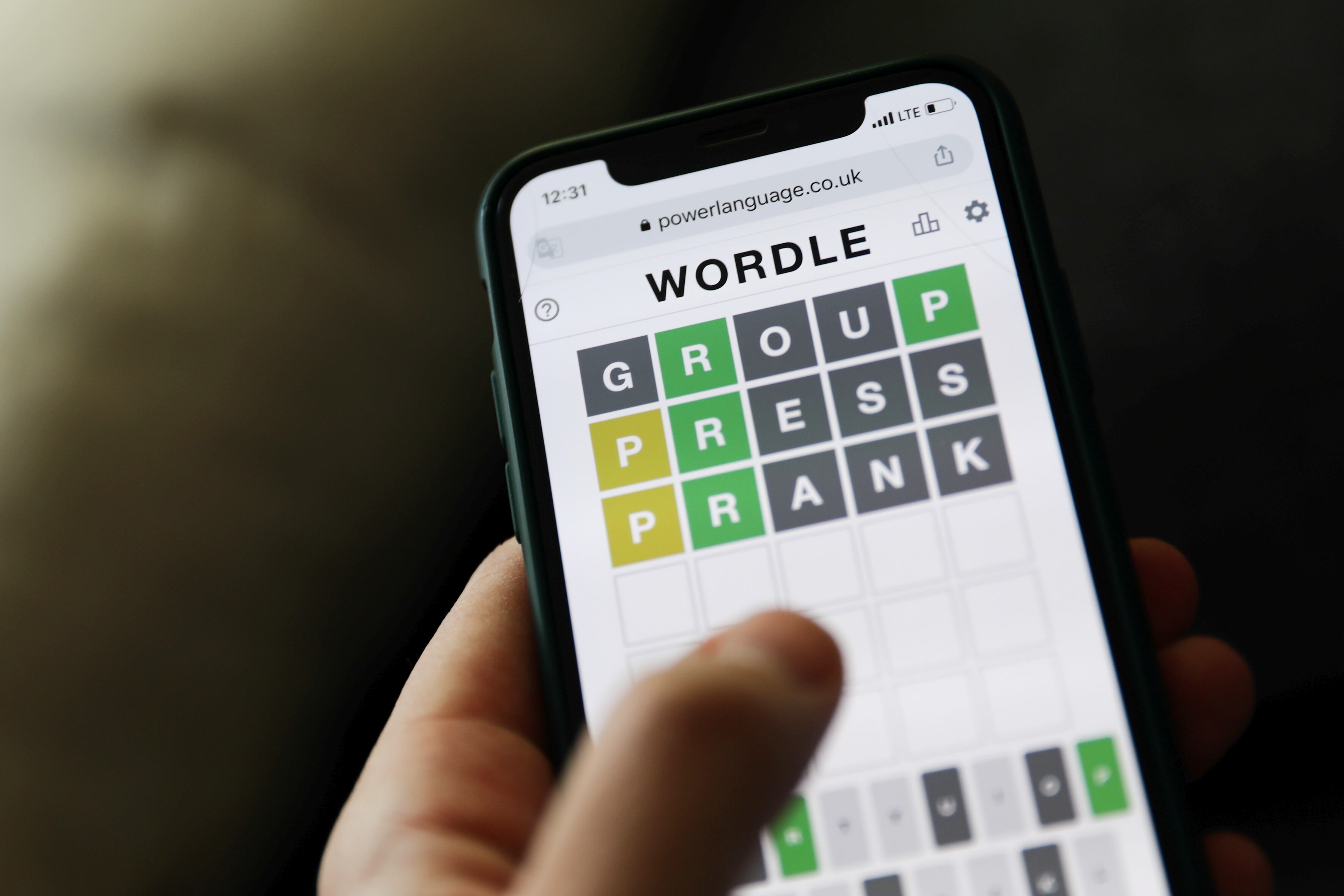 Wordle game displayed on a phone screen is seen in this illustration photo taken in Krakow, Poland on January 23, 2022. (Photo by Jakub Porzycki/NurPhoto via Getty Images)