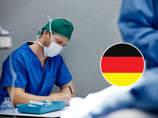 Enfermero revisando la historia clínica en centro médico / Bandera de Alemania (Getty Images)
