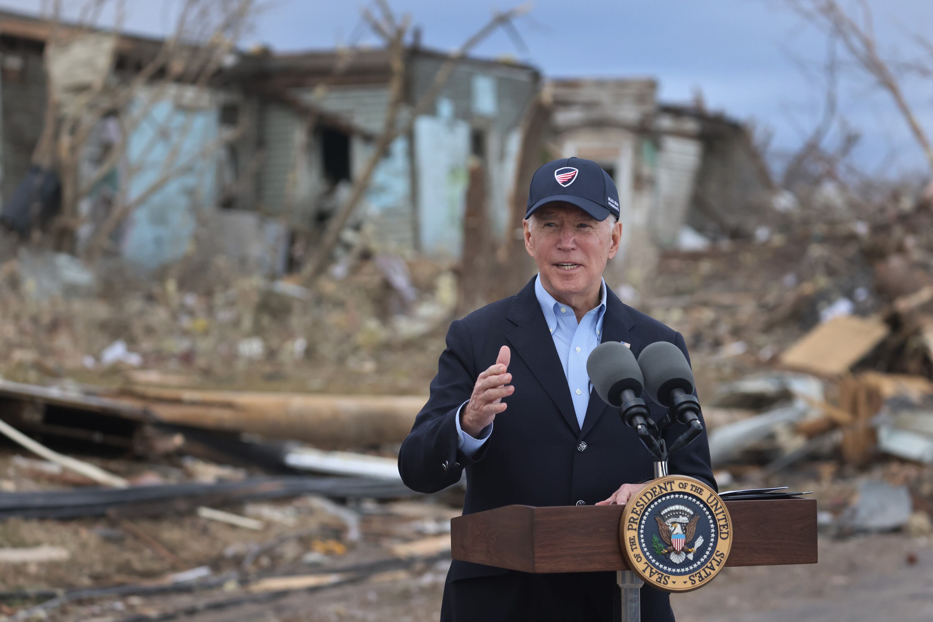 DAWSON SPRINGS, KENTUCKY - DECEMBER 15: US President Joe Biden speaks to the press after touring areas damaged by Friday's tornado on December 15, 2021 in Dawson Springs, Kentucky. Multiple tornadoes touched down in several Midwest states late Friday, causing widespread destruction and leaving scores of people dead and injured.  (Photo by Scott Olson/Getty Images)