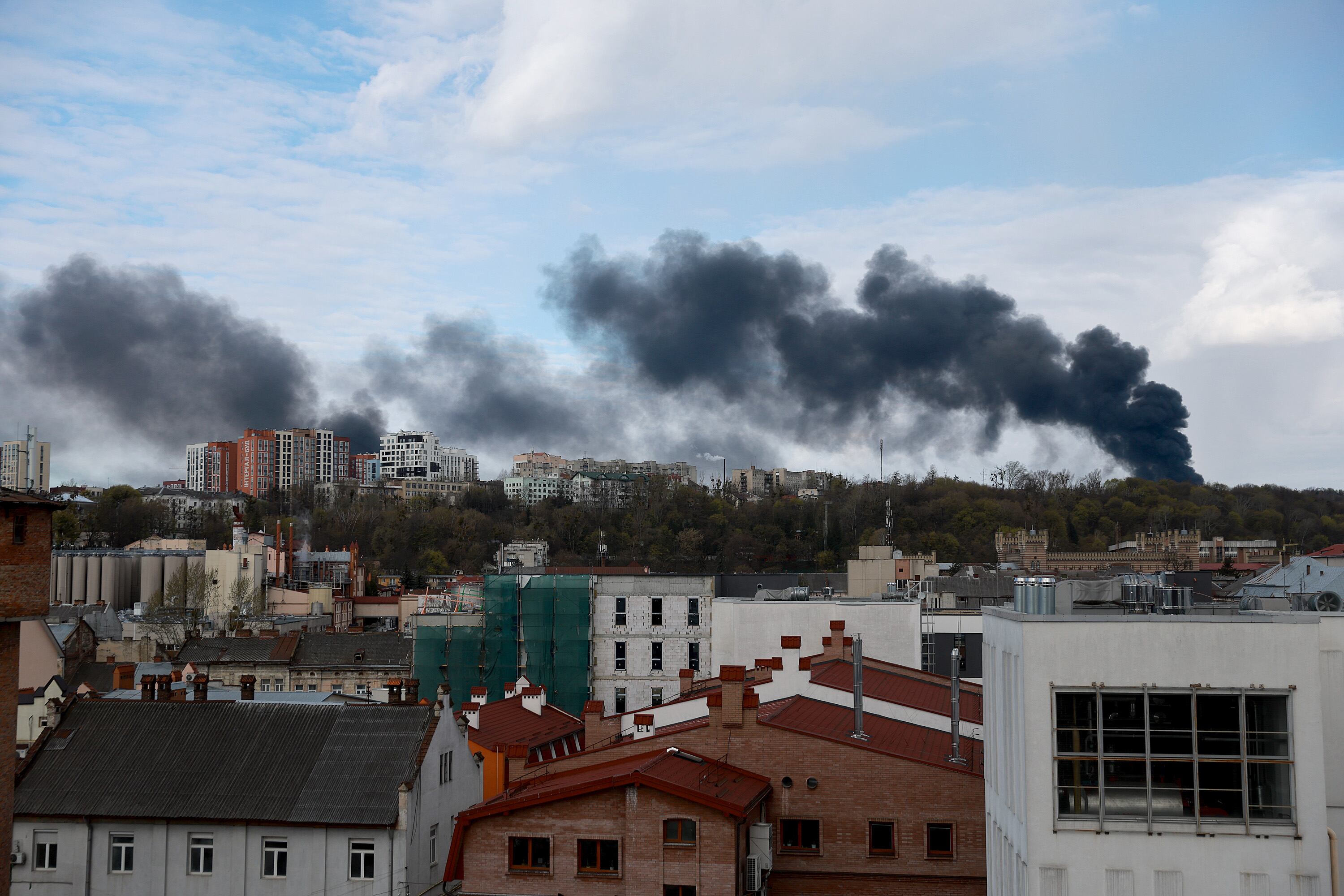 LVIV, UKRAINE - APRIL 18: Smoke is seen on the horizon after Russian missiles struck the area on April 18, 2022 in Lviv, Ukraine. At least six people were killed and eight wounded in missile strikes in different areas of the city, according to the governor. (Photo by Joe Raedle/Getty Images)