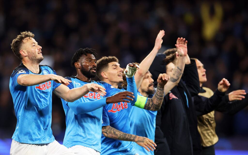 16 March 2023, Italy, Neapel: Soccer: Champions League, SSC Napoli - Eintracht Frankfurt, knockout round, round of 16, second leg, Stadio Diego Armando Maradona. Napoli's players cheer after the victory. Photo: Oliver Weiken/dpa (Photo by Oliver Weiken/picture alliance via Getty Images)