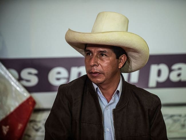 Peru&#039;s leftist presidential candidate Pedro Castillo, of the Peru Libre party, speaks during a press conference with the foreign press association at his party&#039;s headquarters in Lima on June 15, 2021. - Castillo, narrowly leading in the vote count, rejected calls from the right-wing camp for elections held nine days ago to be annulled. &quot;The calls continue for an election to be annulled,&quot; Castillo told foreign journalists, adding: &quot;we are patiently awaiting a result&quot; even as his rival Keiko Fujimori has claimed fraud and members of her entourage have called for new elections to be held. (Photo by Ernesto BENAVIDES / AFP) (Photo by ERNESTO BENAVIDES/AFP via Getty Images)