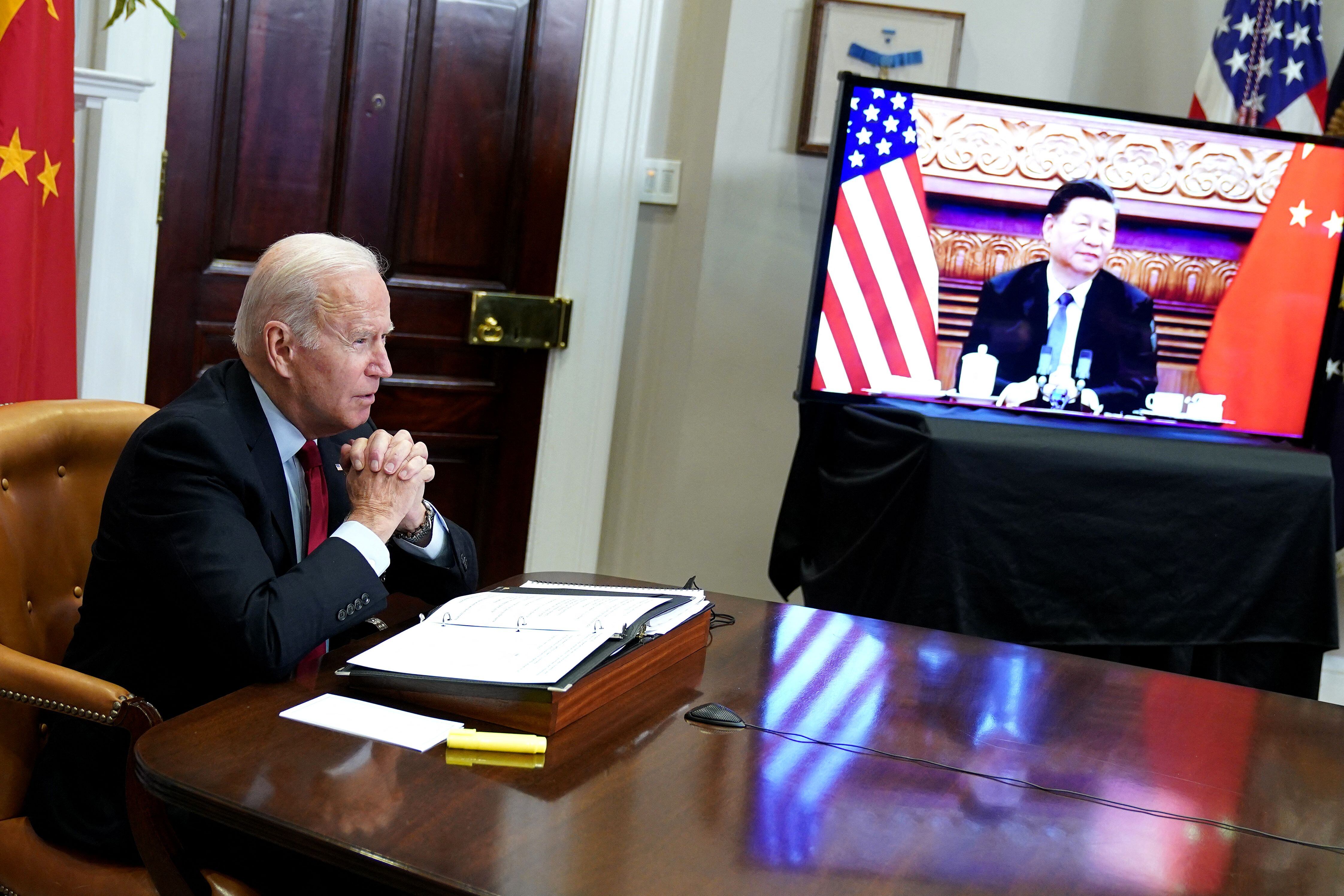 US President Joe Biden meets with China's President Xi Jinping during a virtual summit from the Roosevelt Room of the White House in Washington, DC, November 15, 2021. (Photo by MANDEL NGAN / AFP) (Photo by MANDEL NGAN/AFP via Getty Images)