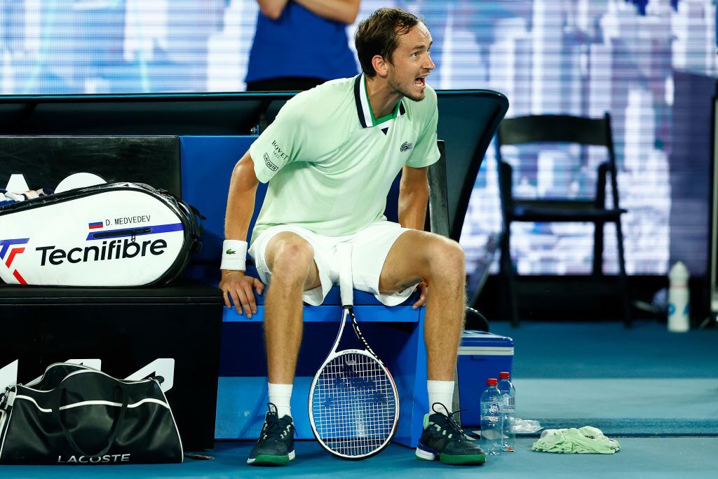 MELBOURNE, AUSTRALIA - JANUARY 28: Daniil Medvedev of Russia speaks to the chair umpire in his Men's Singles semi-final match against Stefanos Tsitsipas of Greece during day 12 of the 2022 Australian Open at Melbourne Park on January 28, 2022 in Melbourne, Australia. (Photo by Daniel Pockett/Getty Images)