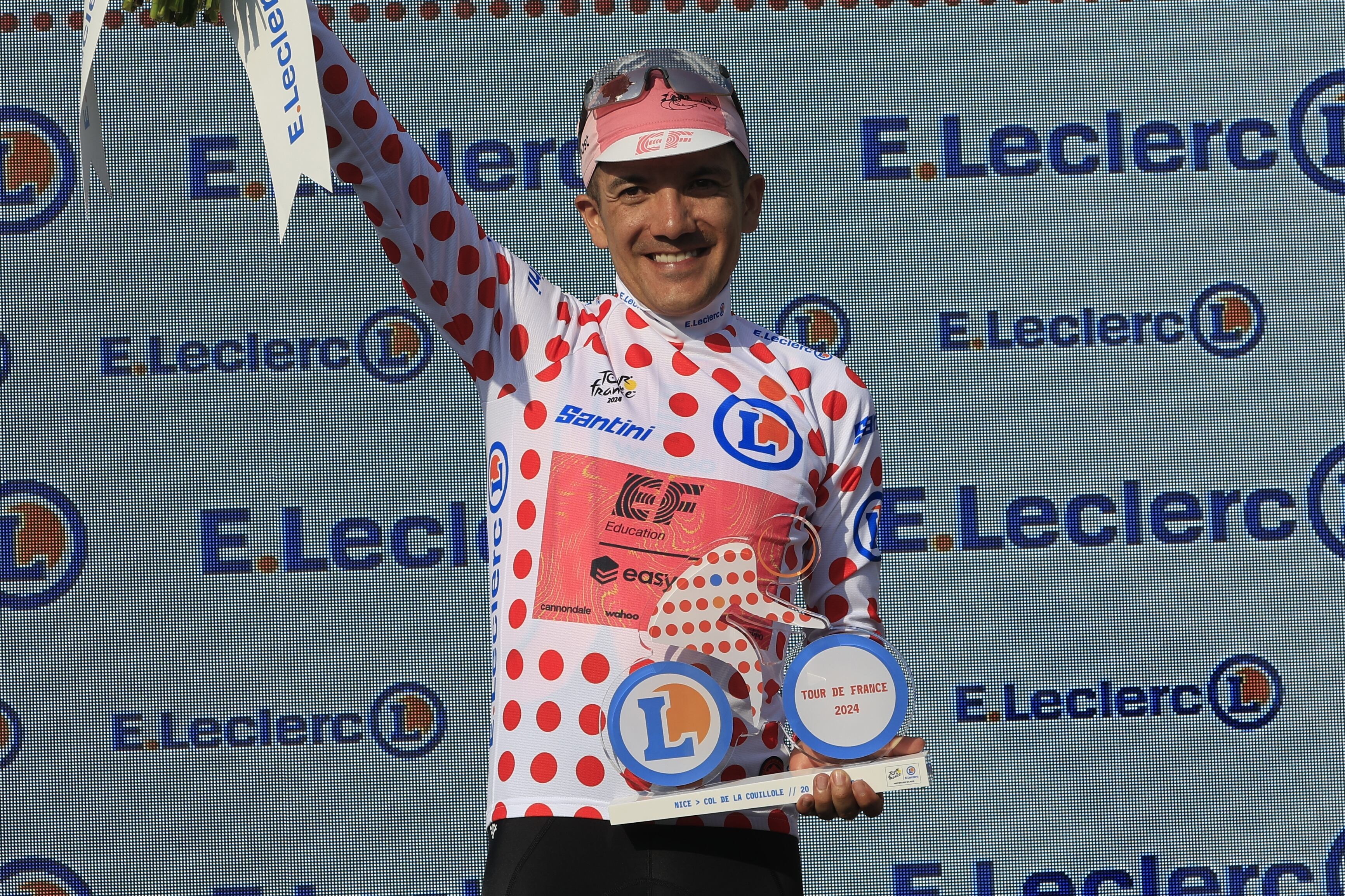 Col De La Couillole (France), 20/07/2024.- Ecuadorian rider Richard Carapaz of EF Education - EasyPost celebrates on the podium wearing the best climber's Polka Dot jersey following the 20th stage of the 2024 Tour de France cycling race over 132km from Nice to Col de la Couillole, France, 20 July 2024. (Ciclismo, Francia, Niza) EFE/EPA/GUILLAUME HORCAJUELO