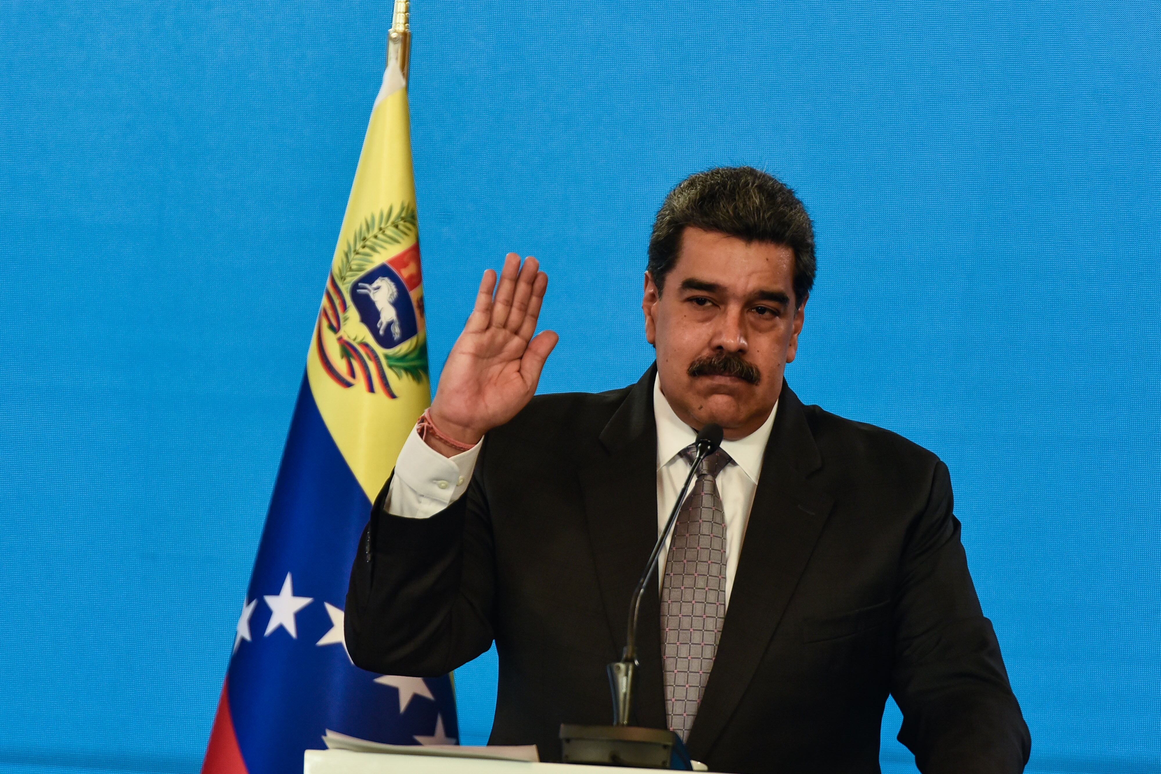 CARACAS, VENEZUELA - FEBRUARY 17: Nicolas Maduro President of Venezuela gestures as he speaks in a press conference at Miraflores Palace on February 17, 2021 in Caracas, Venezuela. Nicolas Maduro President of Venezuela announced the country will start vaccinating health workers from Thursday with the Covid-19 Vaccine Sputnik V. (Photo by Carolina Cabral/Getty Images)