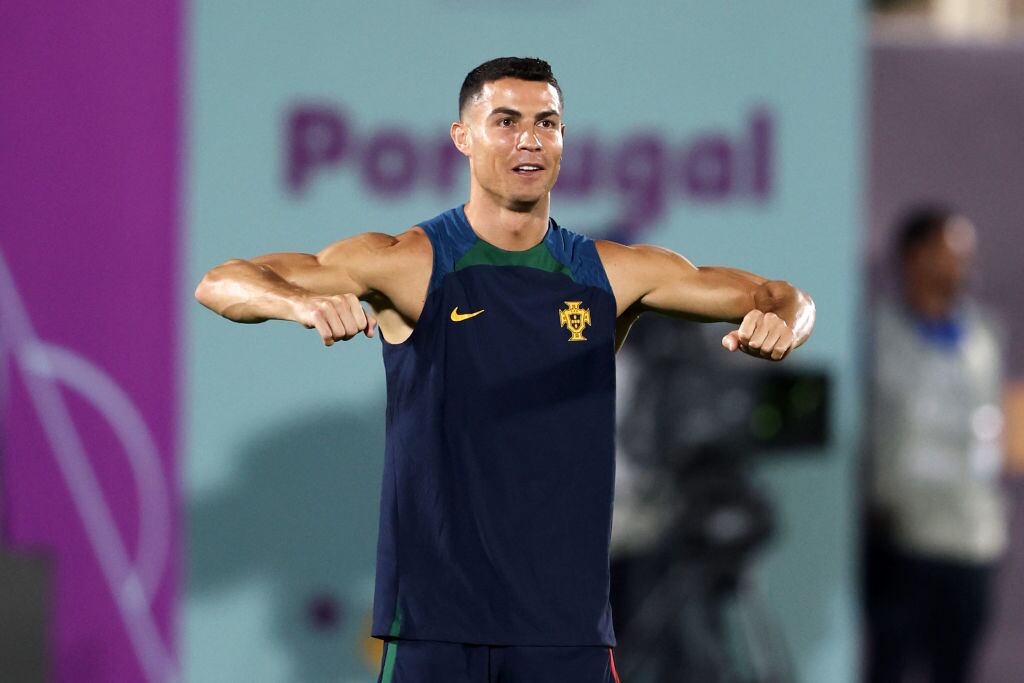 DOHA, QATAR - DECEMBER 01: Cristiano Ronaldo of Portugal reacts during the Portugal Training Session at Grand Hamad Stadium on December 01, 2022 in Doha, Qatar. (Photo by Mohamed Farag/Getty Images)