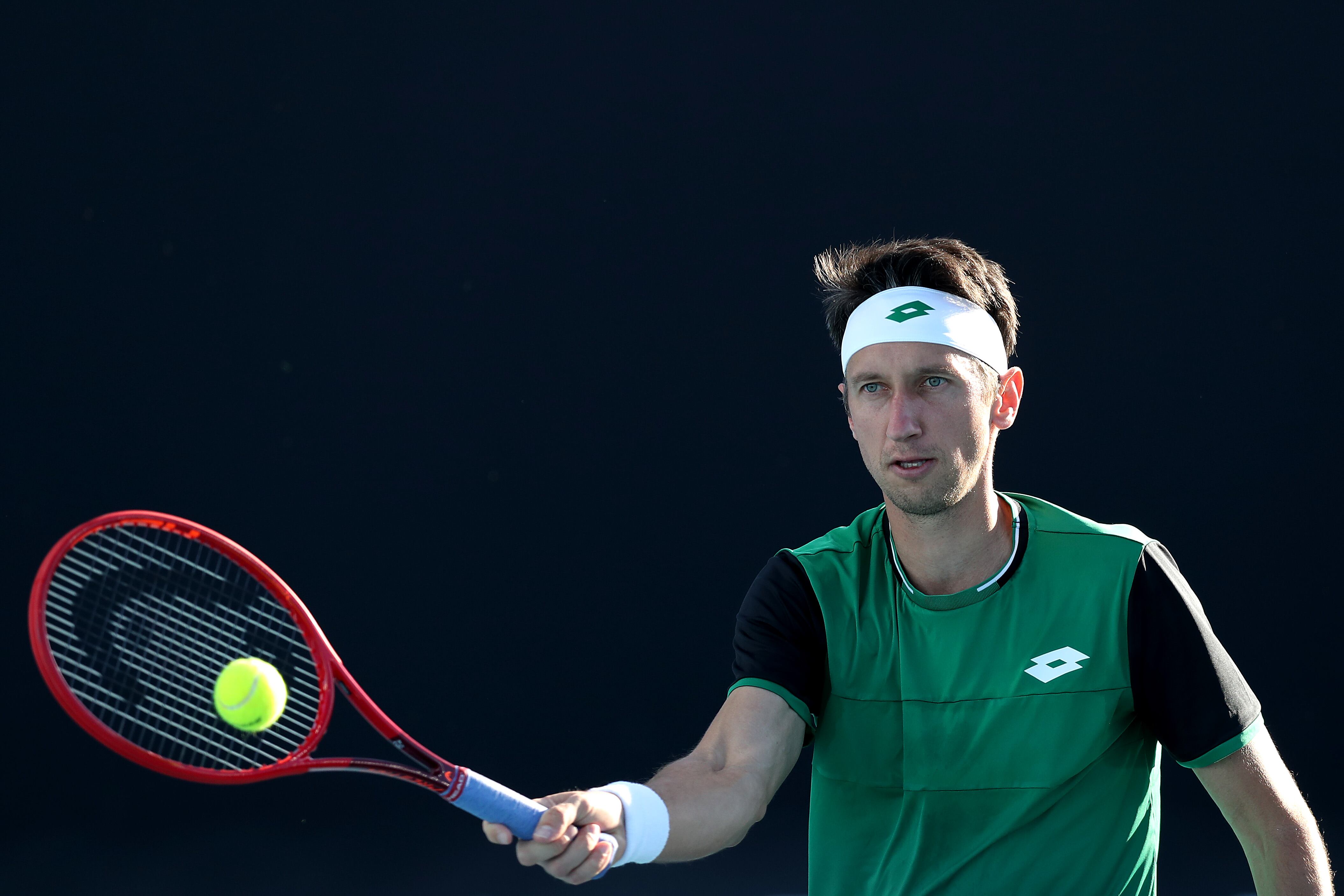 MELBOURNE, AUSTRALIA - FEBRUARY 03: Sergiy Stakhovsky of the Ukraine plays a forehand in his match against Reilly Opelka of the United States during day three of the ATP 250 Great Ocean Road Open at Melbourne Park on February 03, 2021 in Melbourne, Australia. (Photo by Graham Denholm/Getty Images)