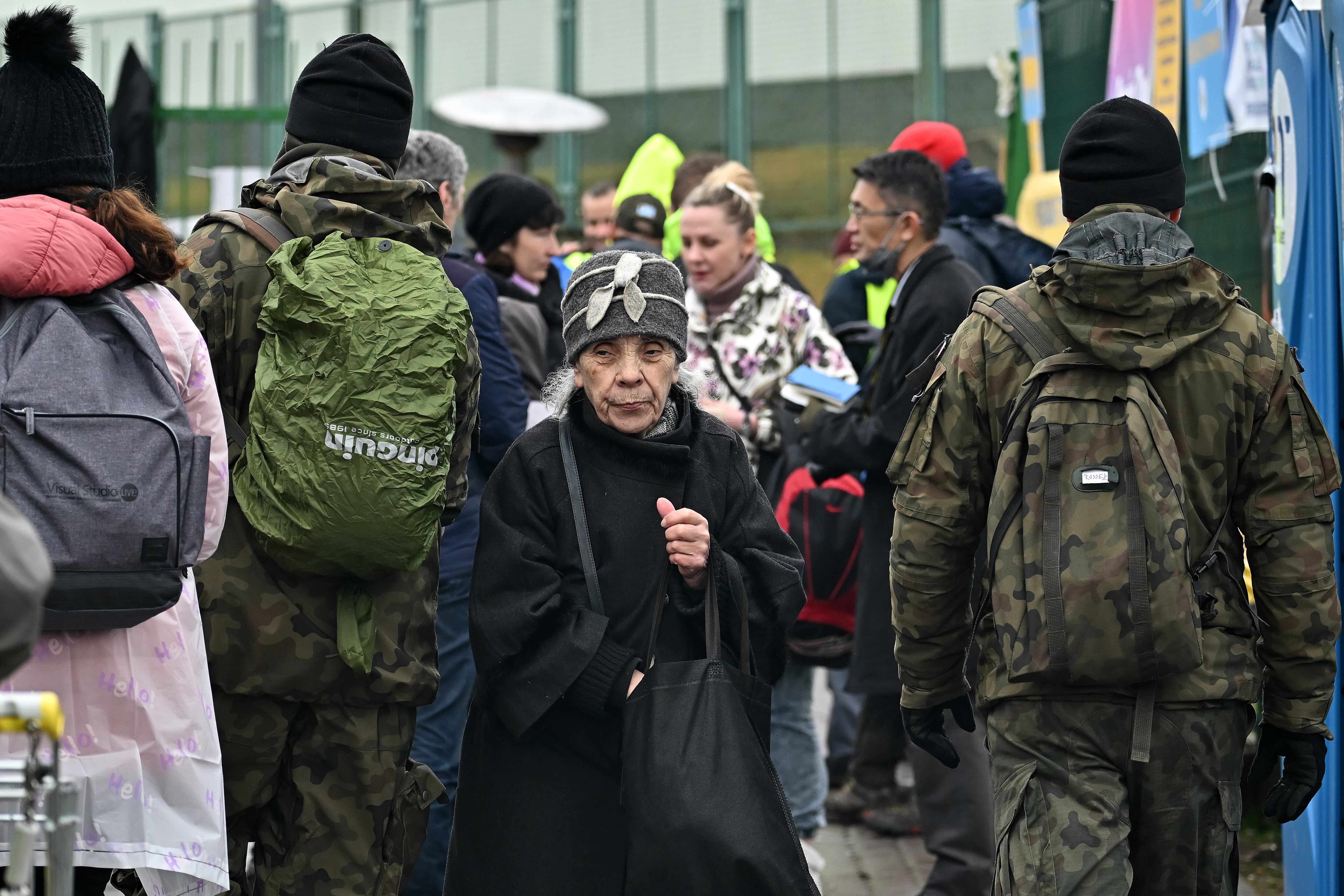 MEDYKA, POLAND - APRIL 01: Refugees and volunteers are seen at Medyka border crossing as people pass through from war-torn Ukraine on April 01, 2022 in Medyka, Poland. More than 4 million people have fled Ukraine since the Russian invasion of that country on February 24, millions more have been internally displaced. (Photo by Jeff J Mitchell/Getty Images)