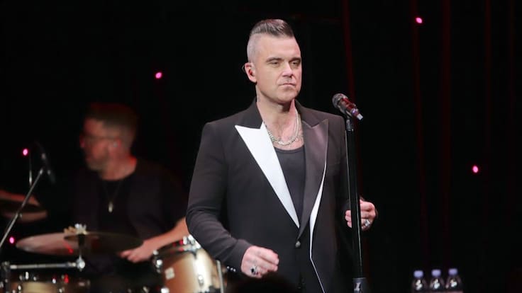 Robbie Williams se encuentra en cuarentena estricta en una paradisíaca isla. Foto: Getty Images