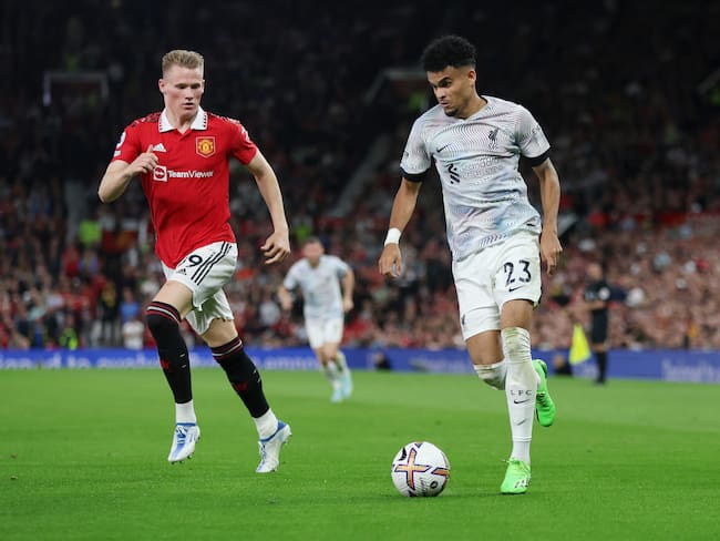 Scott McTominay y Luis Díaz. (Photo by Clive Brunskill/Getty Images)