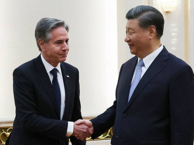 Antony Blinken y Xi Jinping. (Photo by LEAH MILLIS/POOL/AFP via Getty Images)