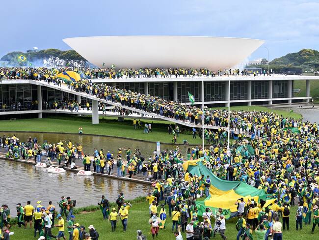 Manifestantes en Brasil. (Photo by EVARISTO SA/AFP via Getty Images)