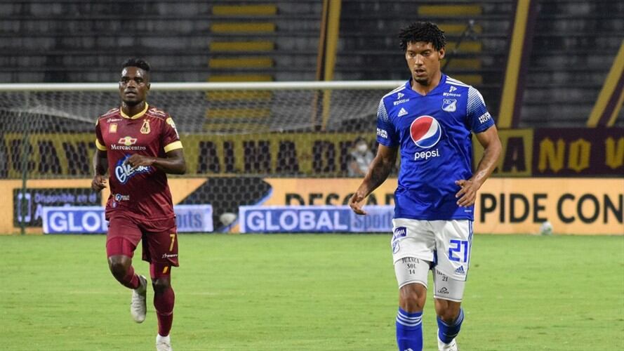 Jugadores del Deportes Tolima y de Millonarios en la liga colombiana. Foto: Colprensa - Cortesía Dimayor