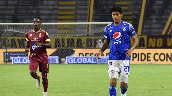 Jugadores del Deportes Tolima y de Millonarios en la liga colombiana. Foto: Colprensa - Cortesía Dimayor