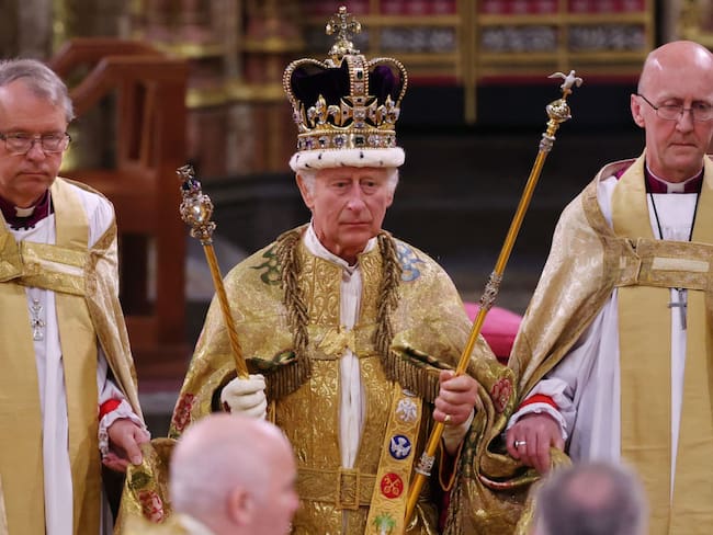 LONDON, ENGLAND - MAY 06: King Charles III stands after being crowned during his coronation ceremony in Westminster Abbey, on May 6, 2023 in London, England. The Coronation of Charles III and his wife, Camilla, as King and Queen of the United Kingdom of Great Britain and Northern Ireland, and the other Commonwealth realms takes place at Westminster Abbey today. Charles acceded to the throne on 8 September 2022, upon the death of his mother, Elizabeth II. (Photo by Richard Pohle - WPA Pool/Getty Images)