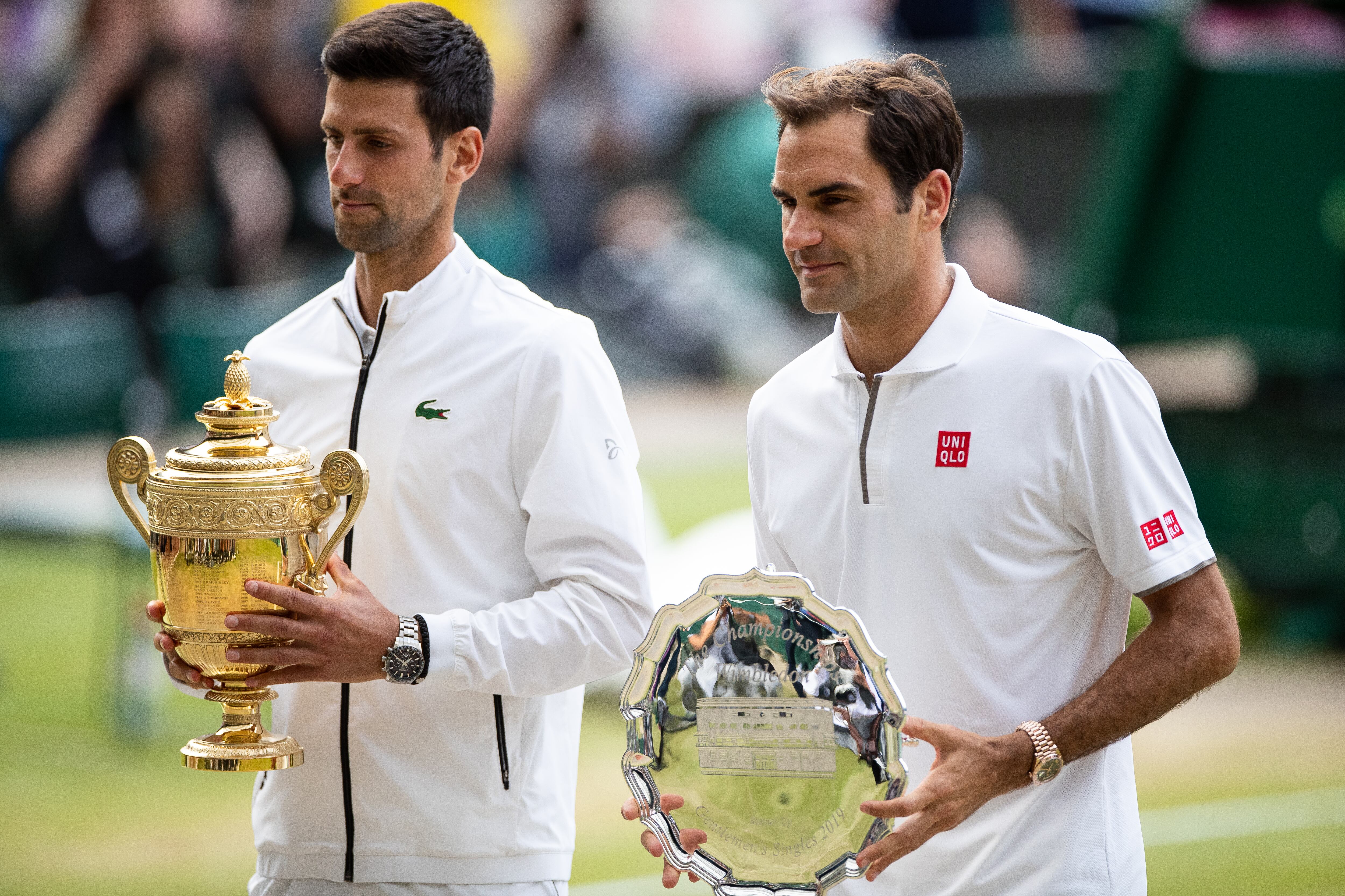 Novak Djokovic y Roger Federer. Foto:  Simon Bruty/Anychance/Getty Images.