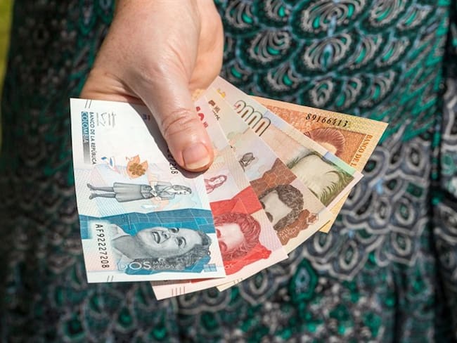 El auxilio de transporte legal corresponde al pago que se realiza a aquel empleado que devenga hasta dos salarios mínimos mensuales. Foto: Getty Images / ANDRZEJ ROSTEK