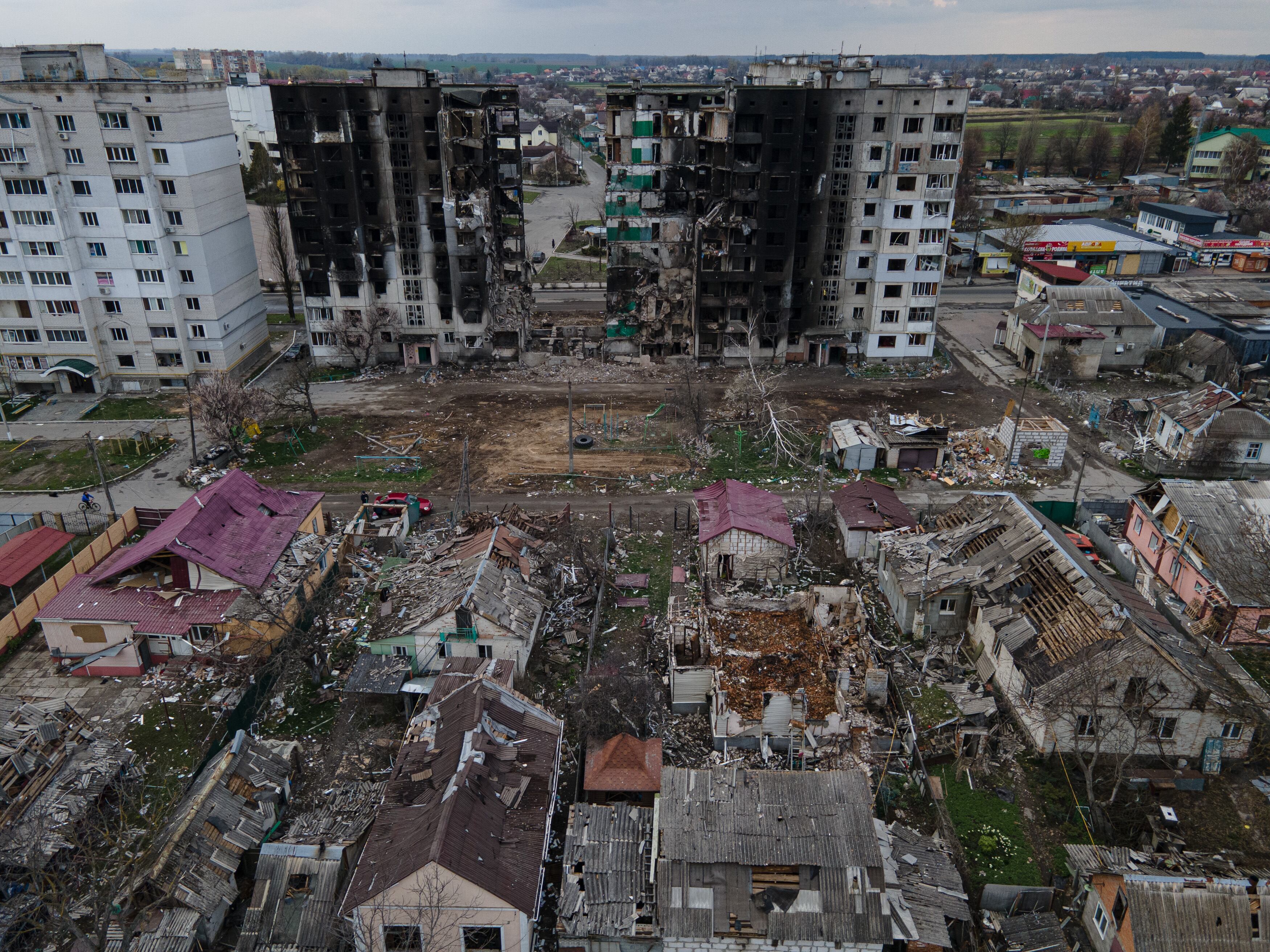 BORODIANKA, UKRAINE - APRIL 21: In this aerial view, a destroyed apartment building is seen next to an area of heavily damaged houses on April 21, 2022 in Borodianka, Ukraine. (Photo by Alexey Furman/Getty Images)