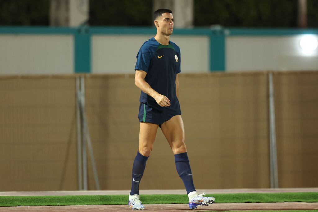 DOHA, QATAR - DECEMBER 05: Cristiano Ronaldo of Portugal looks on during the Portugal Training Sesion on match day -1 at Al Shahaniya SC training site on December 05, 2022 in Doha, Qatar. (Photo by Alexander Hassenstein/Getty Images)