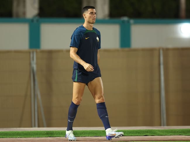 DOHA, QATAR - DECEMBER 05: Cristiano Ronaldo of Portugal looks on during the Portugal Training Sesion on match day -1 at Al Shahaniya SC training site on December 05, 2022 in Doha, Qatar. (Photo by Alexander Hassenstein/Getty Images)